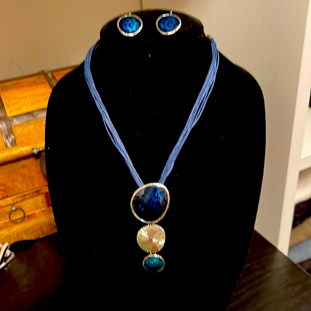 A beautiful one of a kind set of necklace and earrings